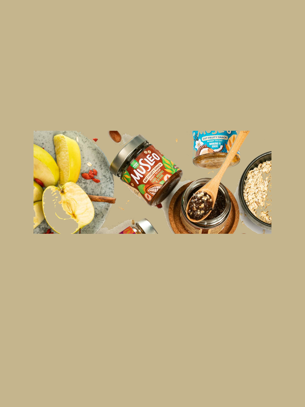 Healthy snack ingredients including bananas, goji berries, and various nut spreads with oats.